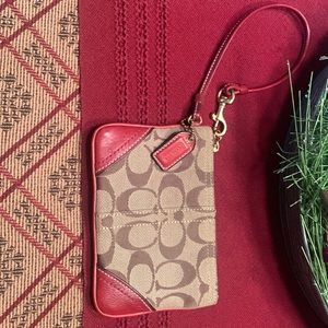 ❌SOLD❌. Coach Jacquard dark red wristlet